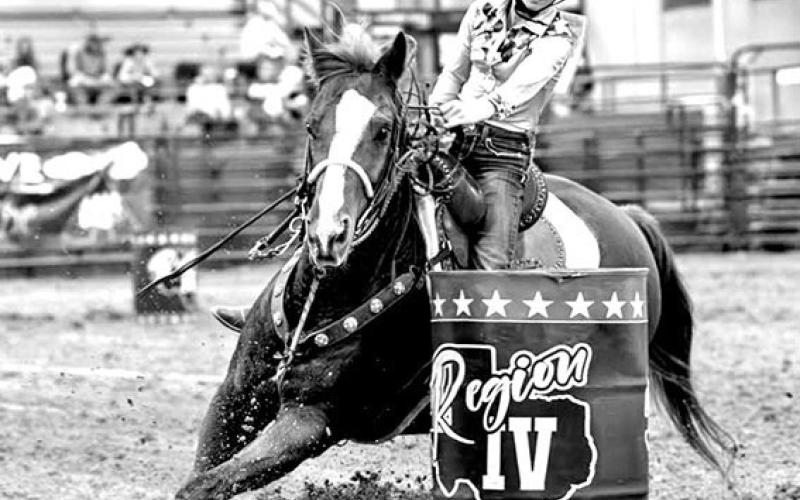 Karli Lowry barrel racing with Joker