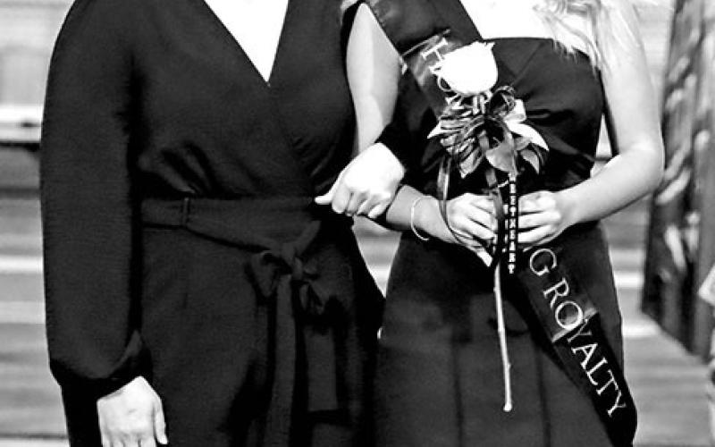 Freshman Football Sweetheart, Aubree Hawkins (right), escorted by her mom, Amanda Newman