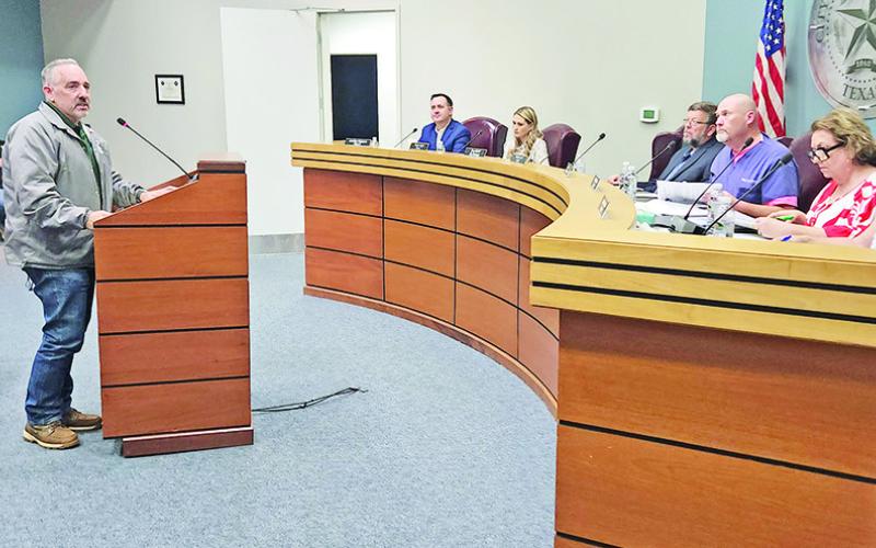 John Ankram talks to the city council about possible structure demolitions