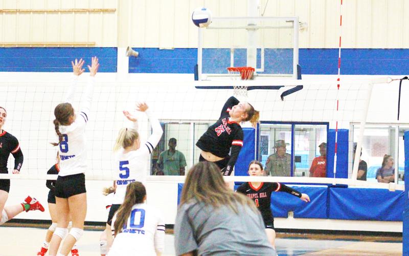 COURTESY PHOTOS / SUSAN LINDSEY - BOWIE COUNTY CITIZENS TRIBUNE The Chapel Hill volleyball team competed at the Hooks tournament last week; Chapel Hill earned a third place finish in the Gold Consolation bracket with a win over Jefferson.