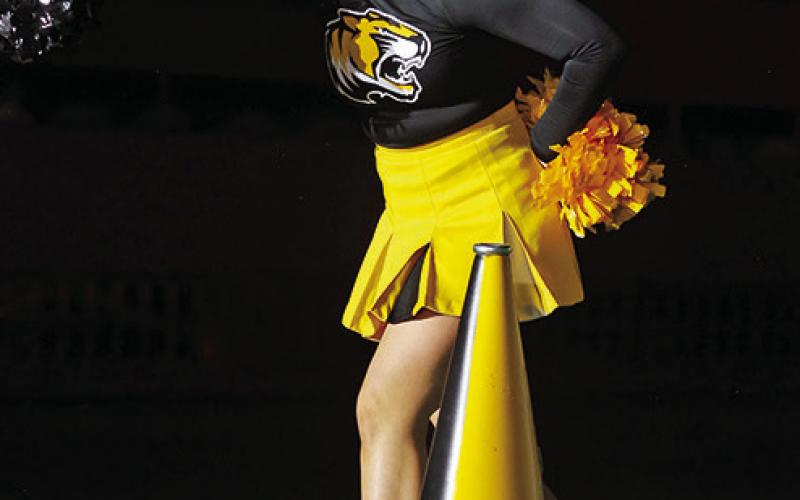Sophomore Kate Ball yells for the Tigers