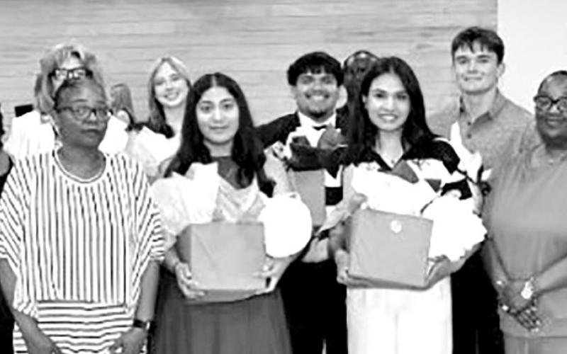 COURTESY PHOTOS / JERRY WALKER Whalyn Payne scholarship winners with MPHS teacher Crystal Jackson James