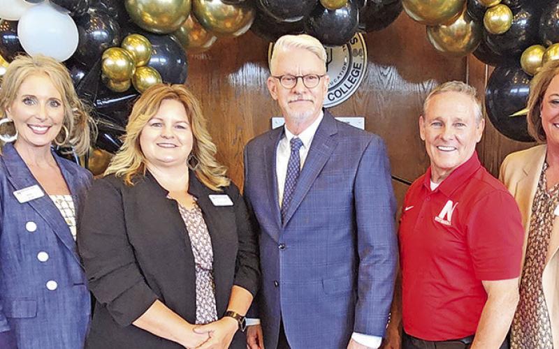 NTCC leaders pose with their retiring president, Dr. Ron Clinton