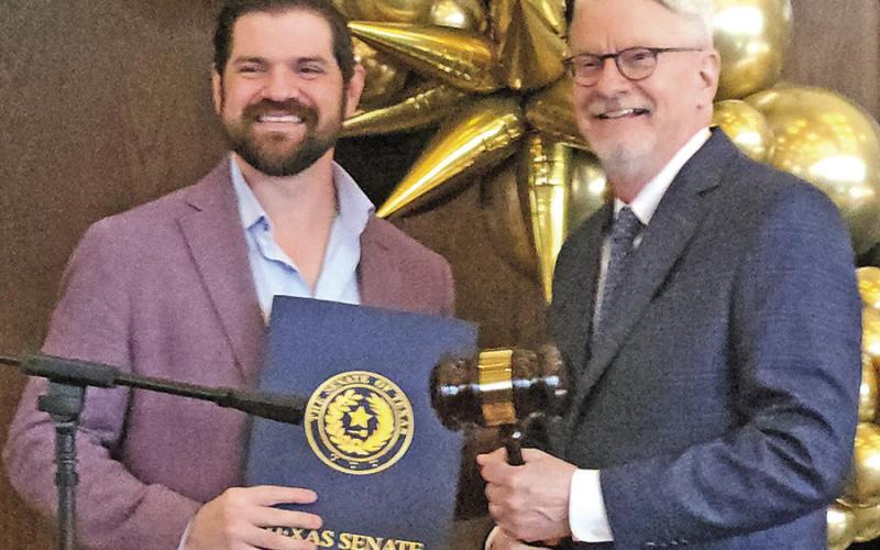 A gavel and letter is presented from Texas Senator Brian Hughes BEE PHOTOS / NICOLE KIMBALL