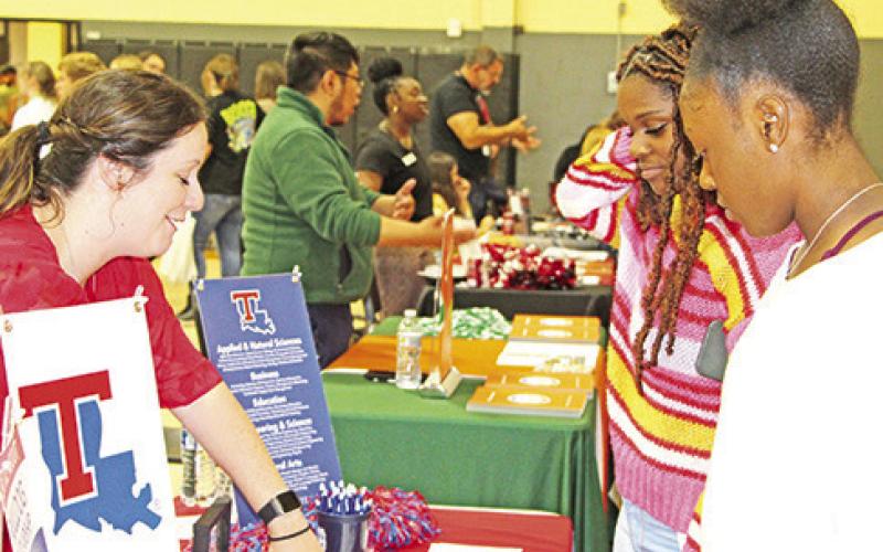 Seniors Paris Beard and Jordyn Hargrave listen about opportunities available at Louisiana Tech University.