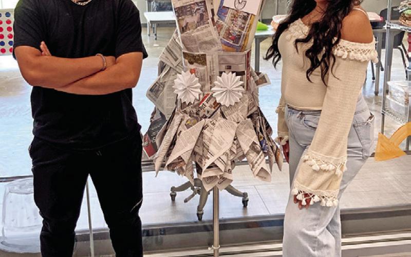 Zachary Flores and Emily Ponce show off their creation (not pictured: Andrew Perez)