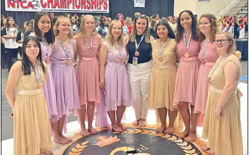 The Rivercrest Winterguard, the “Blazing Blues,” recently performed at the NTCA Winterguard Championships held in Flower Mound where they won a bronze medal in the novice championships with their performance, “Mirage.” COURTESY PHOTO