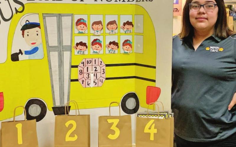 Marcela Mata with her Interactive Bulletin Board