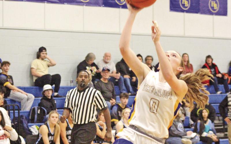 Jaci Caplinger drives for a layup during Harts Bluff’s game against Como-Pickton. The Lady Bulldogs went 1-2 in their final games of 2023 and opened 2024 at New Diana Tuesday afternoon.