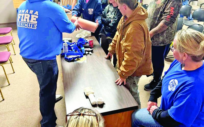 EMS worker shows how to stop a bleed and hands-only CPR COURTESY PHOTO / TITUS REGIONAL EMS