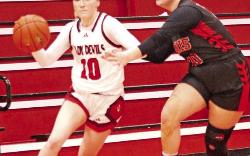 Chapel Hill’s Keira Hawkins (10) dribbles past a Paris Home School player in a home victory last week.