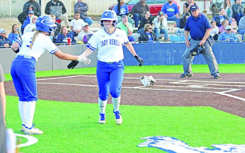 Lady Rebels rally to eliminate