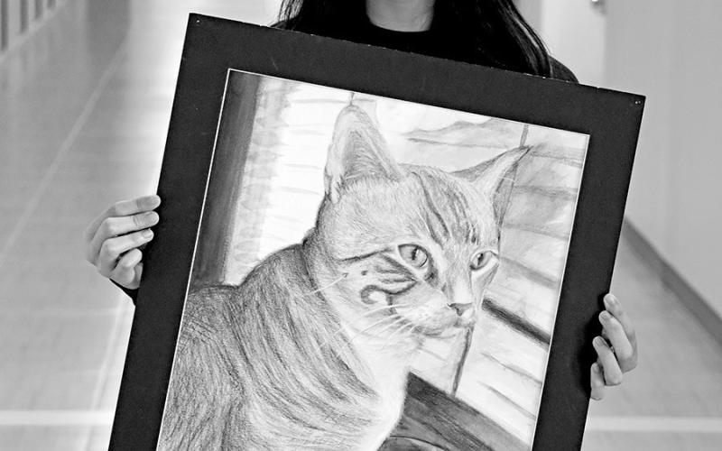 MPHS senior, Valerie Cassio, with her piece, Milonese Courtesy Photo