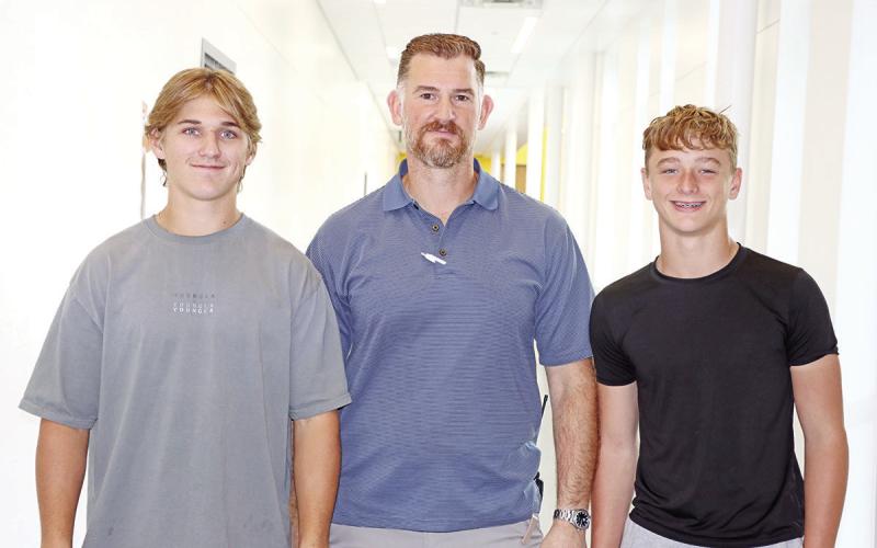 (L to R) Trent Milam, Clay Target Club Coach Josh Blackstone, Lance Albin COURTESY PHOTO