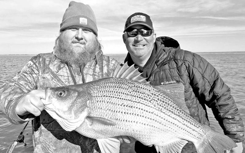 T.J. Jenkins of Yantis was recently notified that the 13.15-pound hybrid striper caught in January at Lake Cooper has been certified a new lake record. The catch beats out the previous record of 11.97 pounds caught by Denise Ann Malone in February 2013. (Courtesy Photo, Michael Littlejohn)