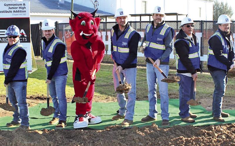Stansell Construction poses with shovels during the groundbreaking for Chapel Hill ISD’s bond projects COURTESY PHOTOS / CHAPEL HILL ISD