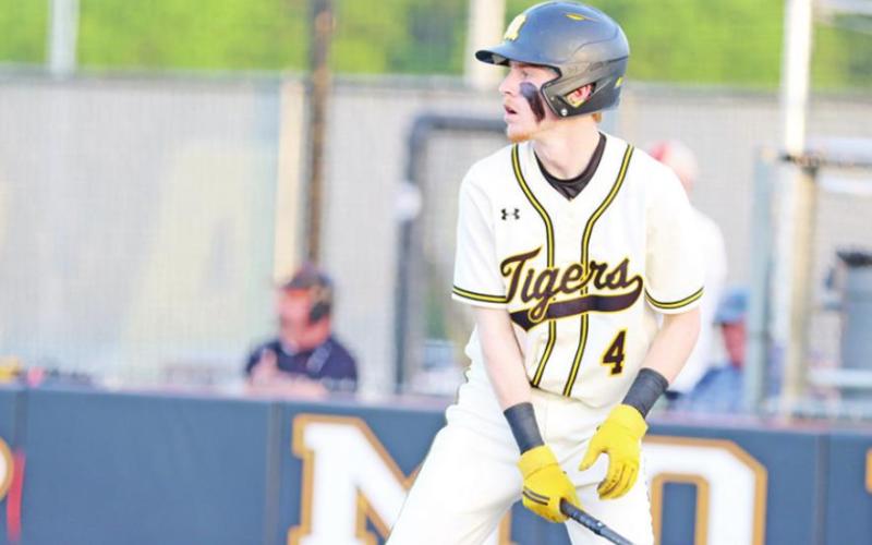 Catcher Layne Pinckard steps into the box against Texas High. PHOTO BY JOHN WHITTEN
