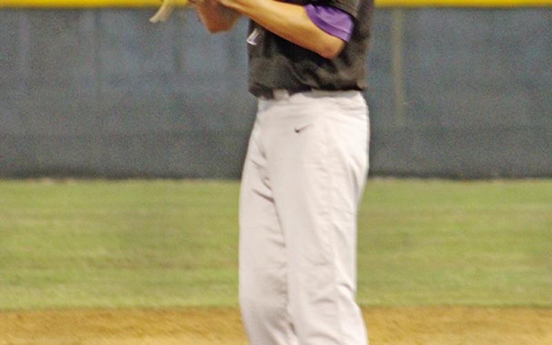 CHAAMP’s David Harrison checks the runner at second. Harrison pitched 5 2/3 innings and allowed only two hits. COURTESY PHOTO