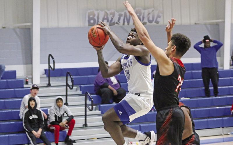 Pewitt’s Kei’drick Hawkins drives for a layup during Friday’s game against Queen City. The Brahmas fell to the Bulldogs, 49-46.