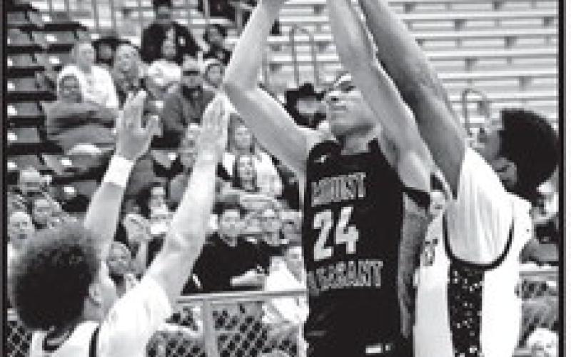 Mount Pleasant’s Carter Chism (24) puts up a shot against The Colony on Friday night.