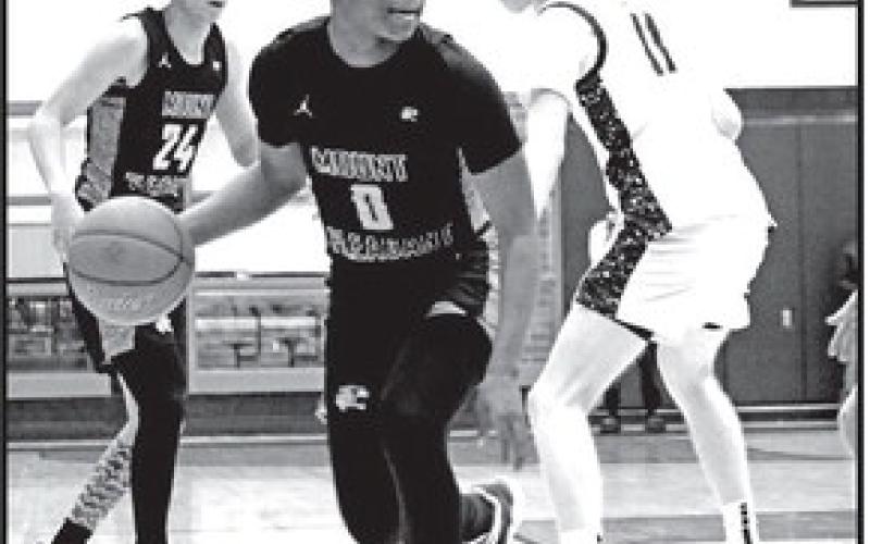 Mount Pleasan’ts Zeke Hill (0) dribbles down court during Friday night’s loss in Royce City to The Colony.