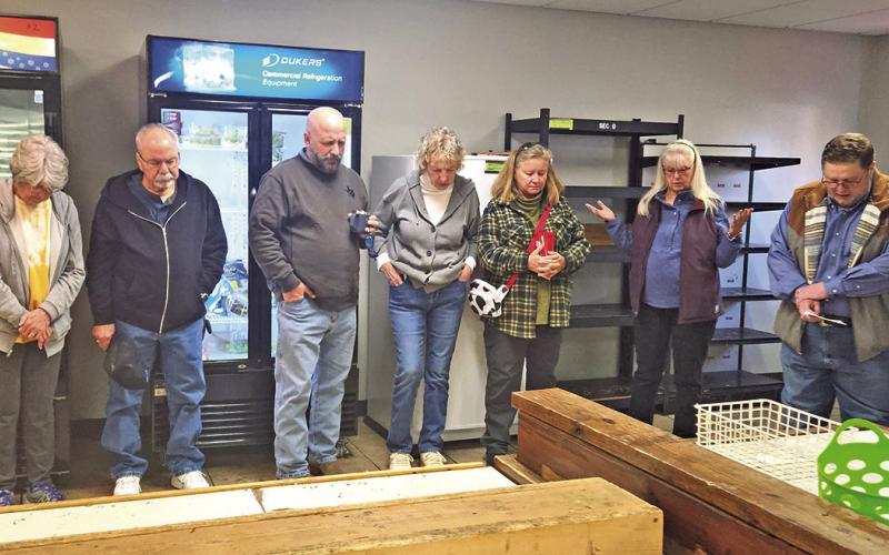 Starting the new year right: Titus County Cares holds prayer walk through pantry