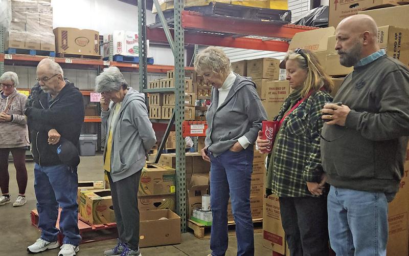 Starting the new year right: Titus County Cares holds prayer walk through pantry