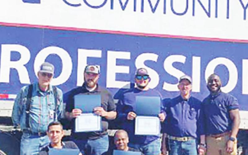Pictured (top row from left) is: Bob Wentzell (Instructor), Steven McNutt (Graduate), Bradley Daniels (Graduate), Ed Kerley (Instructor), and Jimmy Smith (Workforce Developer). Pictured (bottom row from left) is: Jorge Castillo (Graduate), and William Lasley (Graduate). COURTESY PHOTO