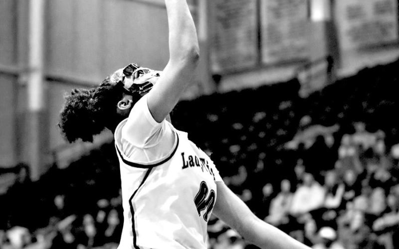 Khiya Bolton attacks the basket and scores for the Lady Tigers. Bolton scored 10 points in the district win on Saturday.