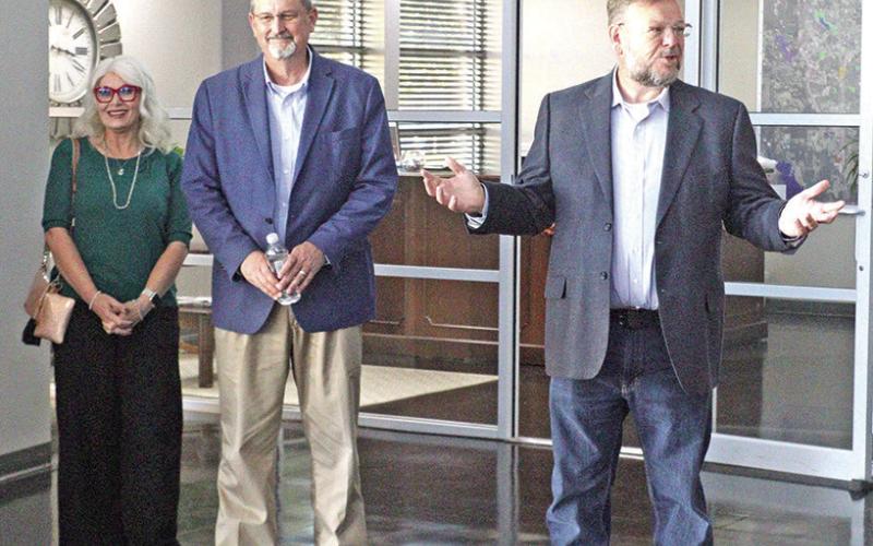 Mayor Wesley Lyon II (right) encourages all in attendance to meet City Manager Rob Vine (middle) and wife Kristy Vine (left).