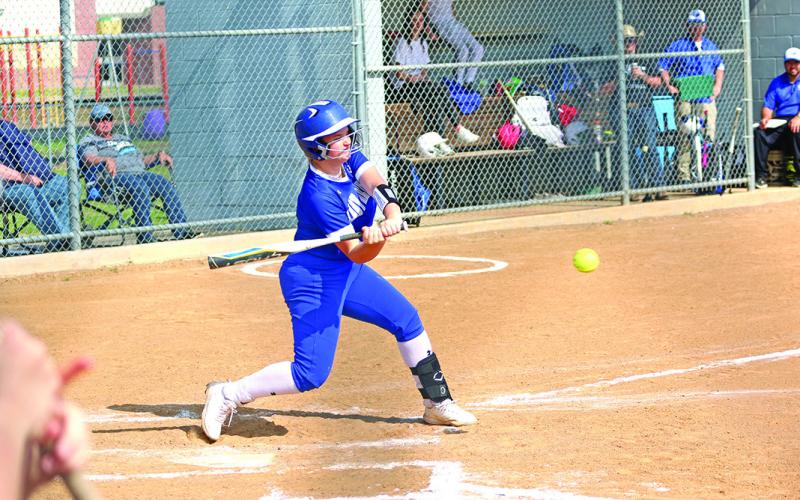Rivercrest’s Avery Martin swings during Monday’s game against Sulphur Bluff. Martin went 3-3 with an inside-the-park home run, five RBIs and four runs scored in the Lady Rebels’ 15-0 win. TRIBUNE PHOTO / QUINTEN BOYD