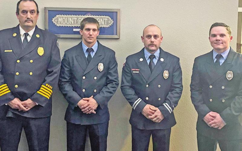 Medal of Valor: From left to right: Deputy Chief Brad Eubanks, Firefighter Trevor Jessee, Captain Phil Fry and Firefighter Riley Russell. COURTESY PHOTOS