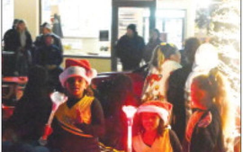 It was merry and bright Dec. 2 as parade floats traveled around the downtown square during Mount Pleasant Rotary Club’s Christmas Parade. FILE PHOTOS