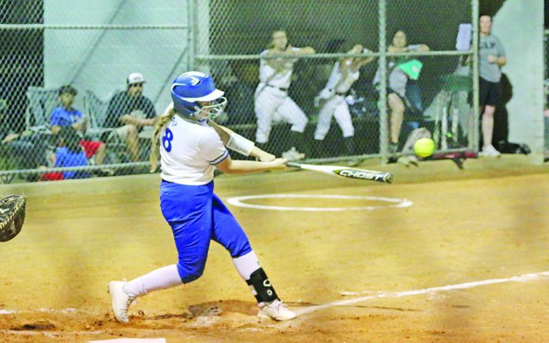 Avery Martin connects on a swing during a recent game. The Rivercrest Lady Rebels traveled to Saltillo Tuesday and will host Sulphur Bluff at 11 a.m. Saturday. TRIBUNE PHOTO / QUINTEN BOYD