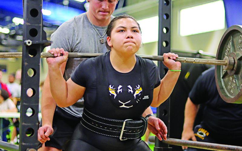 2022 State Champion, Nayeli Jaimes, performs a squat