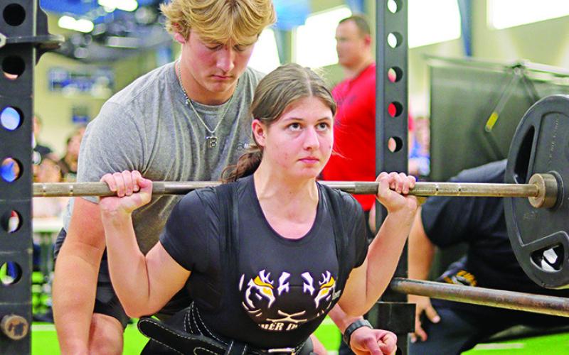Junior Zoe Zittel concentrates on completing her lift PHOTOS BY MPHS JOURNALISM STUDENT KY GIL