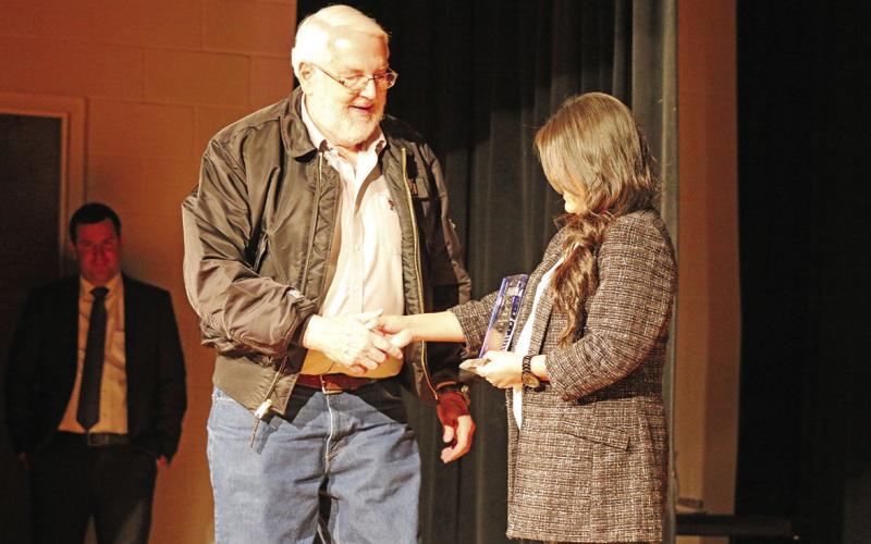 Jim Mason, and the family at Mason True Value Hardware, was honored at Thursday night’s Mount Pleasant Chamber of Commerce banquet with a Lifetime Achievement Award to honor their generations of service and support of the community. See more photos on page 12. TRIBUNE PHOTO / QUINTEN BOYD