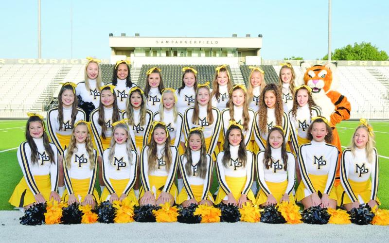 The Mount Pleasant High School Cheerleaders PHOTO BY SHUTTER SNAPPER