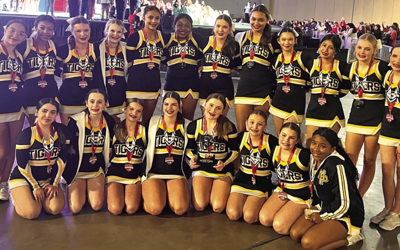 The Mount Pleasant Junior High School Cheerleaders with their 2nd place medals. COURTESY PHOTO