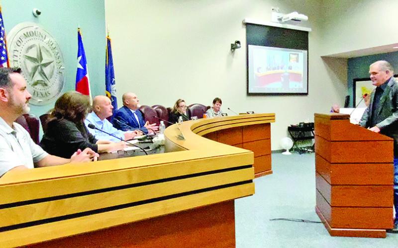 Mt. Pleasant city council listens to a frustrated citizen about the longevity pay decision TRIBUNE PHOTO / NICOLE KIMBALL