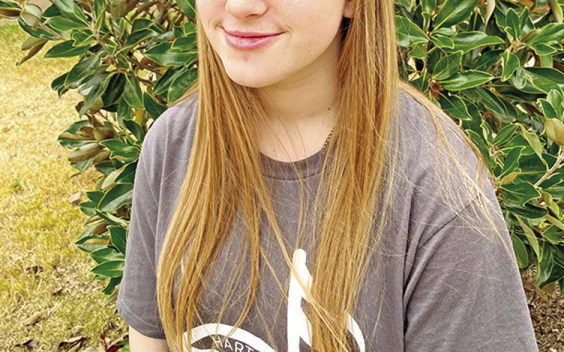 Mattie Merriman, 9th grader at Harts Bluff Early College High School, was chosen to be a part of the Small School Pre-Area Choir for Region 4 Vocal Division. She competed against 12 other Sopranos and landed the position of 5th chair. She will compete for a place in the Texas All-State Choir in January. COURTESY PHOTO