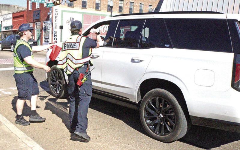 Mount Pleasant Fire Department collects donations during fundraising event.
