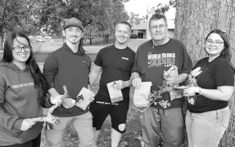 Pictured: Amy Vazquez, Kaden Groda, Garrett Phillips, Honors Biology Professor Dr. Chris McAllister, and Alison Majors Collecting Samples COURTESY PHOTO