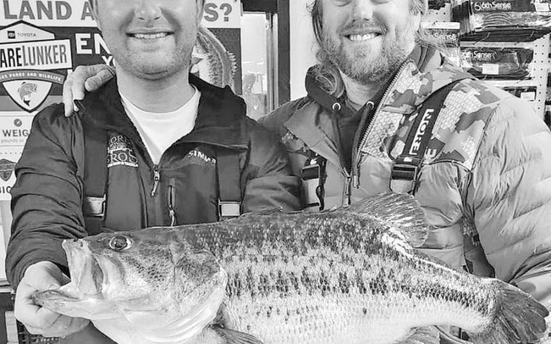 TPWD fisheries biologists discovered a PIT tag inside the 13.89 pounder that Nolan Sprengeler (left) caught on February 24 at Lake O.H. Ivie. The tag identified the fish as the same fish Jim Smith caught two years ago. It previously weighed 14.22 pounds. (PHOTO COURTESY JOSH JONES)