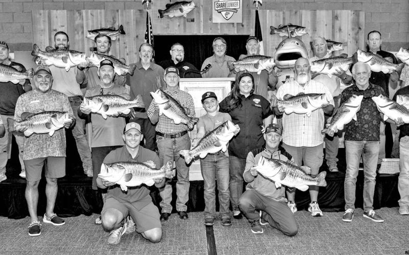Legacy Lunker donors receive a free fiberglass replica of their catch from Lake Fork Taxidermy, ShareLunker clothing, a Bass University subscription and other goodies. Anglers also are entered in a pair of year-end drawings for $5,000 shopping sprees. Pictured here are the 17 anglers responsible for 18 entries last season. The fish produced about 190,000 fingerlings. (TPWD Photo)