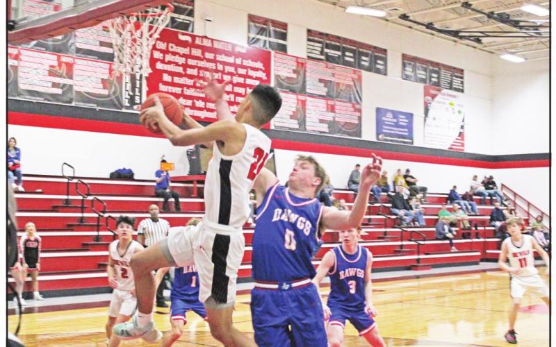 Chapel Hill’s Anthony Ramirez drives for a layup during a recent game. TRIBUNE PHOTO / QUINTEN BOYD