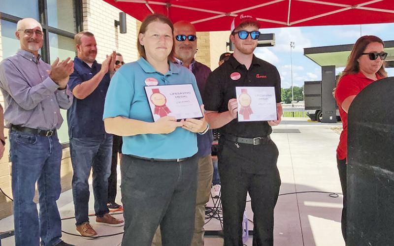 Xander Lynn and Lisa Avance receive award for saving baby locked in a car TRIBUNE PHOTOS / NICOLE KIMBALL