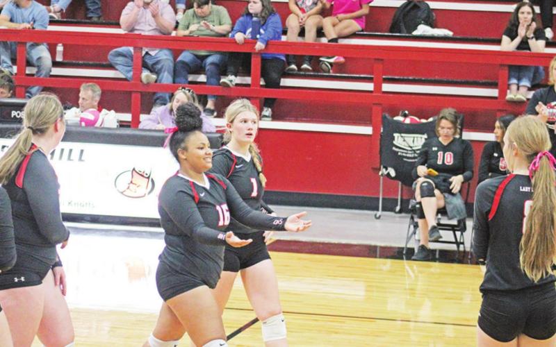 Soraya Solis (#16), Kaylee Tompkins (#1) and the Chapel Hill Lady Devils return seven players from last year’s team and will be part of District 13-3A, which saw no changes in volleyball. TRIBUNE PHOTO / QUINTEN BOYD