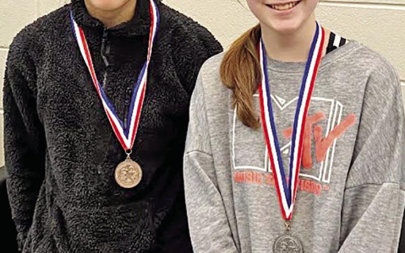 Oral Reading Prose: Renata Fernandez (left) and Kelsie Shelton (right)