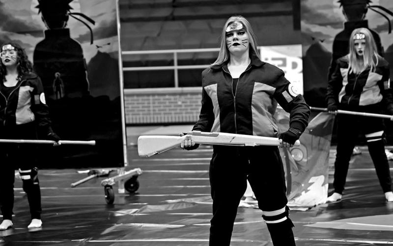 JVB members (L to R) Alheli Ramirez, Isabella Furnish, and Katherine Thurman perform their show, “Monster”, based on the anime series, Naruto, at the North Texas Colorguard Association Cadet and Novice Championships COURTESY PHOTO